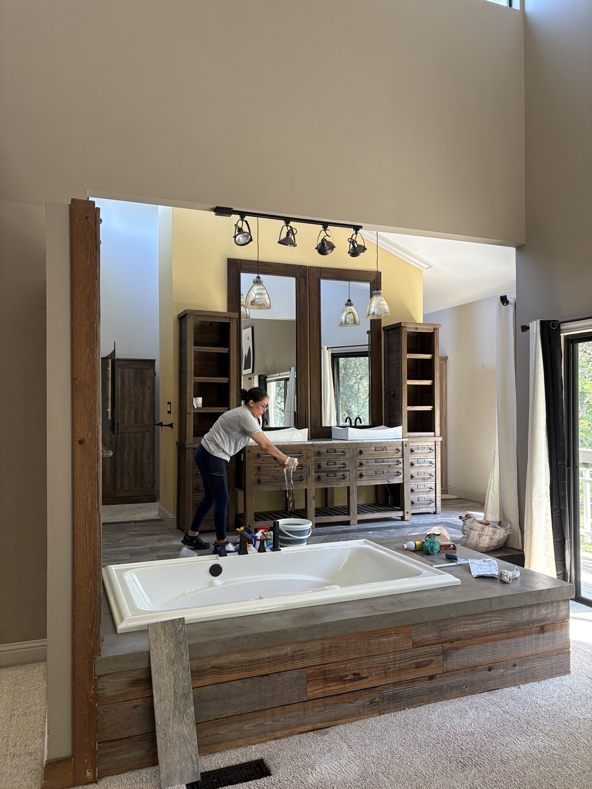 Linda’s Housekeeping cleaning a large bathroom vanity area